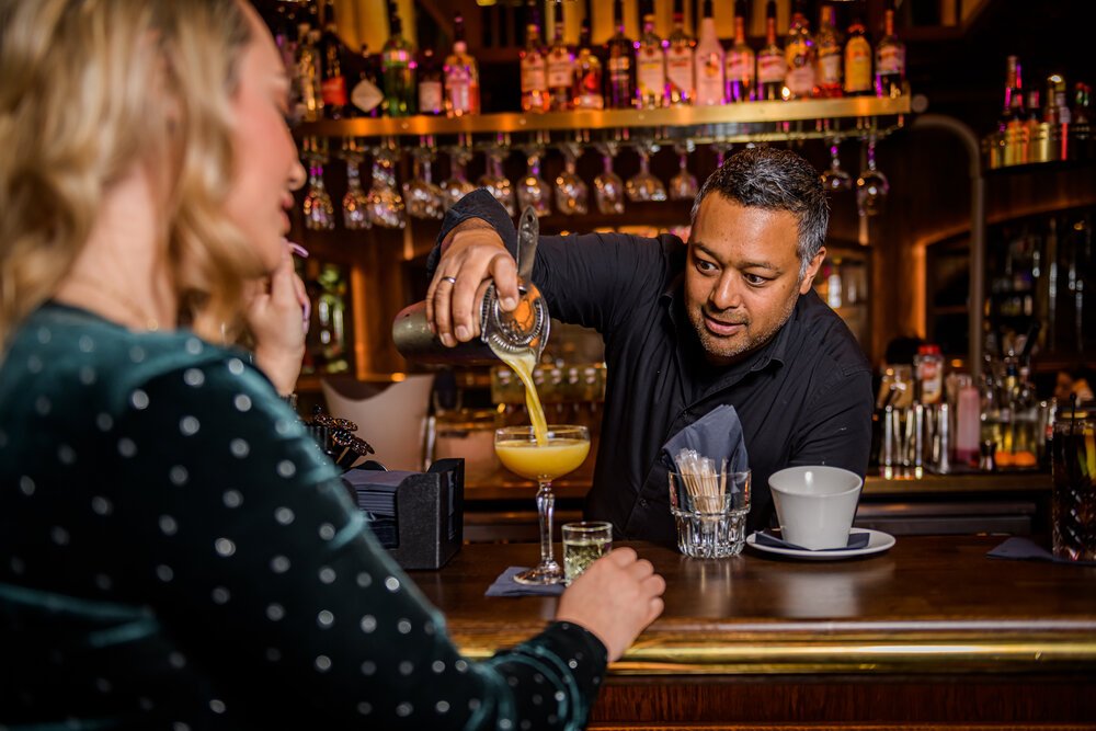 Bartender crafting cocktails